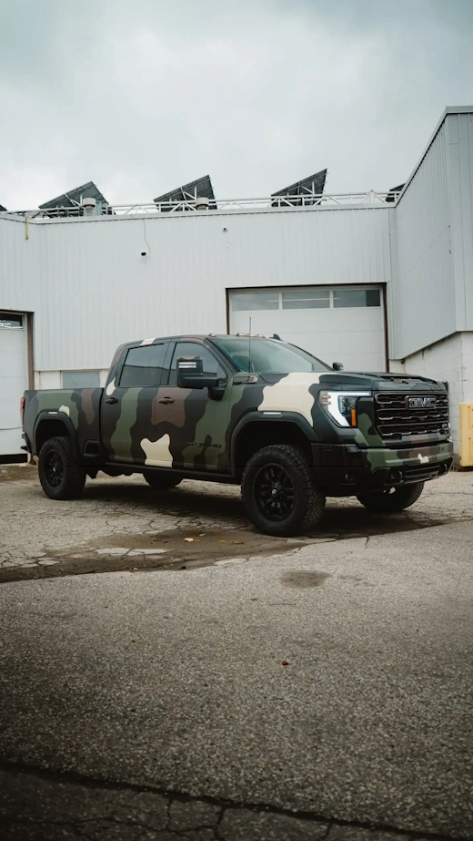 Green sports car with vinyl wrap